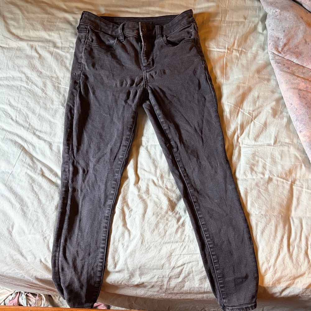 AE 4s Black Skinny Jeans